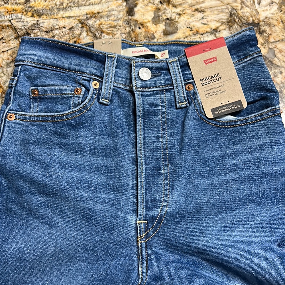 New Levi’s jeans, size 27”